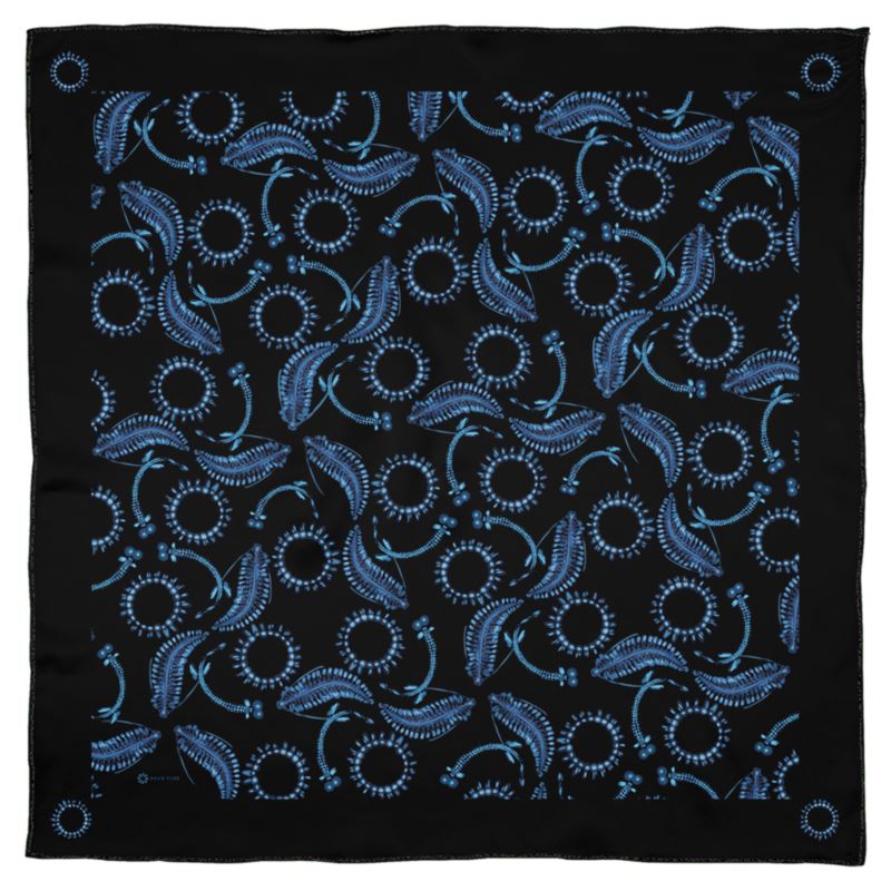 This black and dark blue square Georgette silk scarf is decorated with illustrations inspired by the dark ocean waters. Besides the jellyfish and deep sea dragon fish illustrated on the scarf, we included the Tomopteris, sometimes called the ocean glow-stick, which is a graceful swimmer. This scarf comes in two sizes and honors wild and beautiful creatures which flash and glow in the ocean depths.